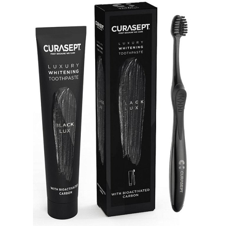 Curasept Luxury Black Lux - Dentifricio sbiancante al carbone bioattivo + Spazzolino sbiancante al carbone attivo - 75 ml Curasept Luxury Black Lux - Dentifricio sbiancante al carbone bioattivo + Spazzolino sbiancante al carbone attivo - 75 ml