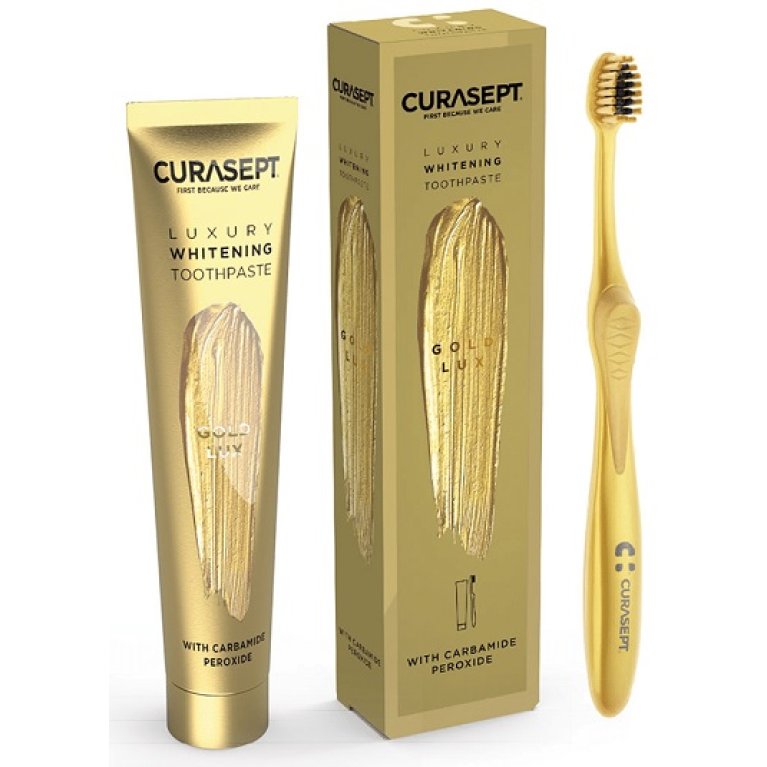 Curasept Luxury Gold Lux - Dentifricio sbiancante con microperle di oro e argento + spazzolino sbiancante al carbone attivo - 75 ml Curasept Luxury Gold Lux - Dentifricio sbiancante con microperle di oro e argento + spazzolino sbiancante al carbone attivo - 75 ml